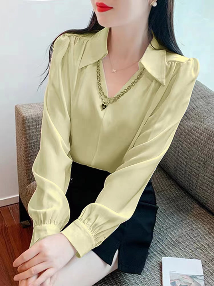 V-neck long sleeve blouse.