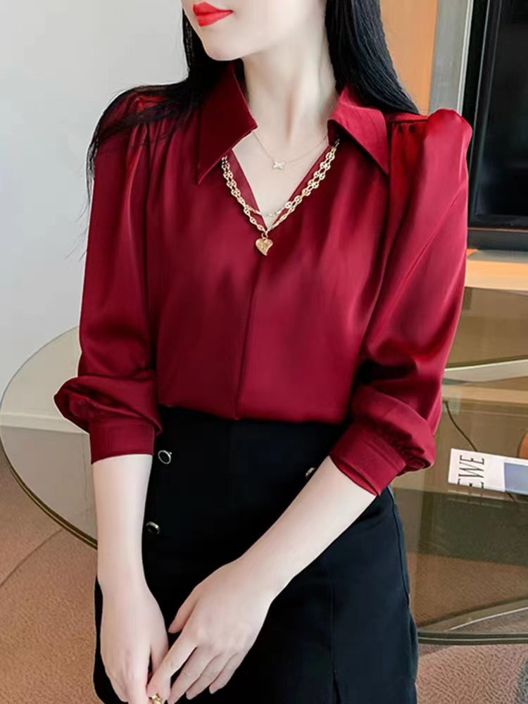 V-neck long sleeve blouse.