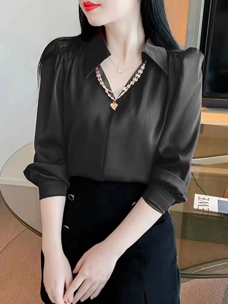 V-neck long sleeve blouse.