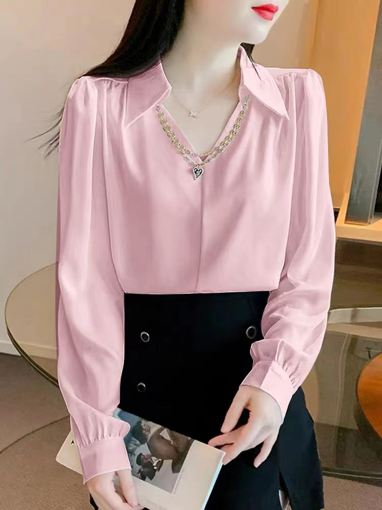 V-neck long sleeve blouse.