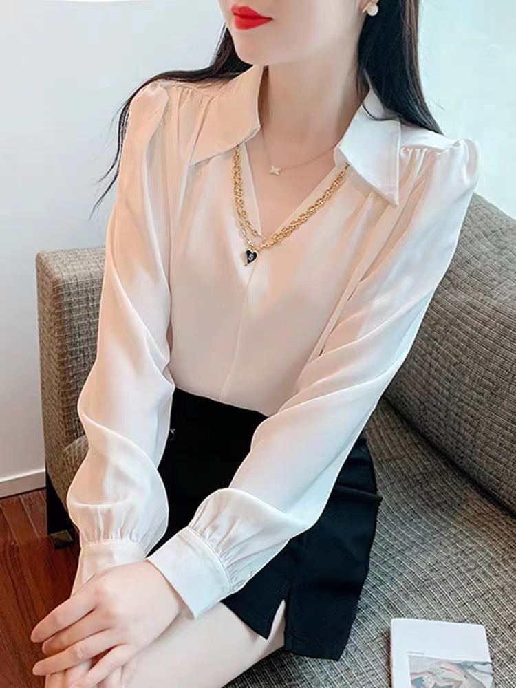 V-neck long sleeve blouse.